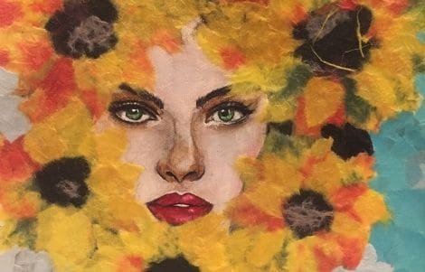 A painted face with green eyes and red lips is surrounded by bright yellow, orange, and black flowers with textured petals.
